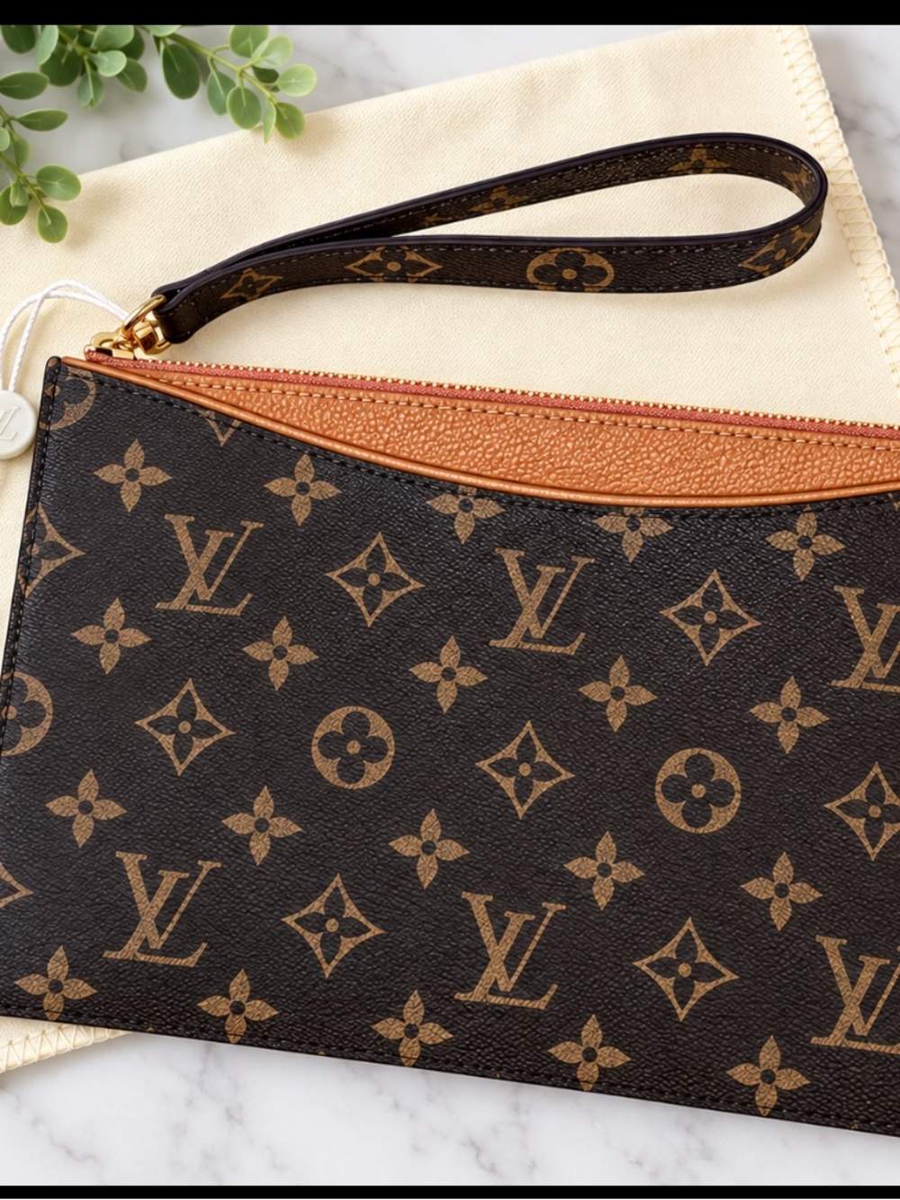 Wristlet in Brown and Tan with Gold Hardware